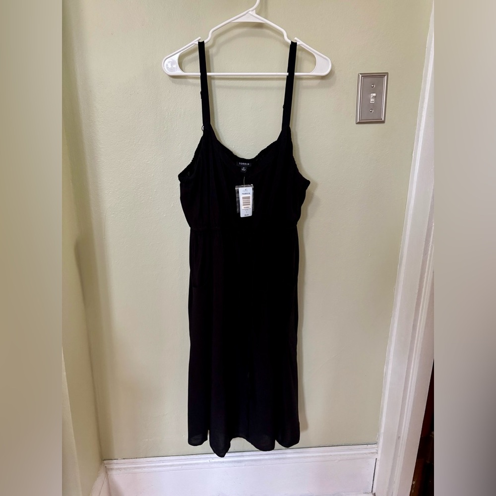 NEW WITH TAGS!! Torrid Black Sleeveless Top with sweetheart neck line.